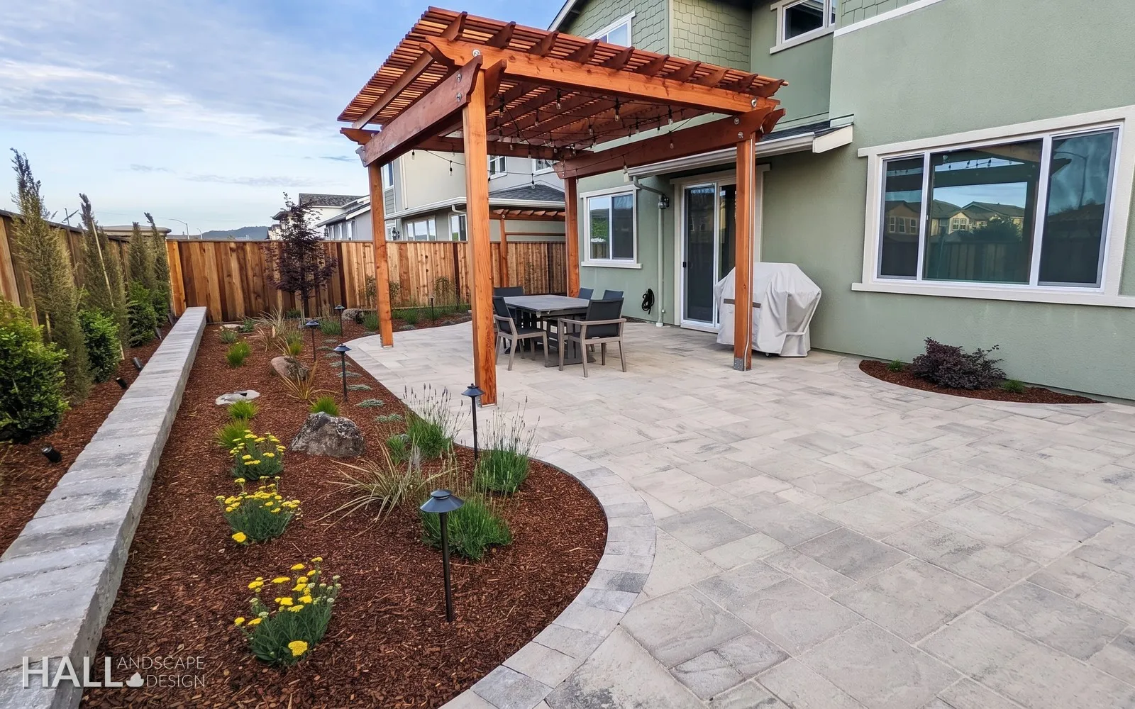 After — Dirt side yard → pergola walk & planted terrace in American Canyon
