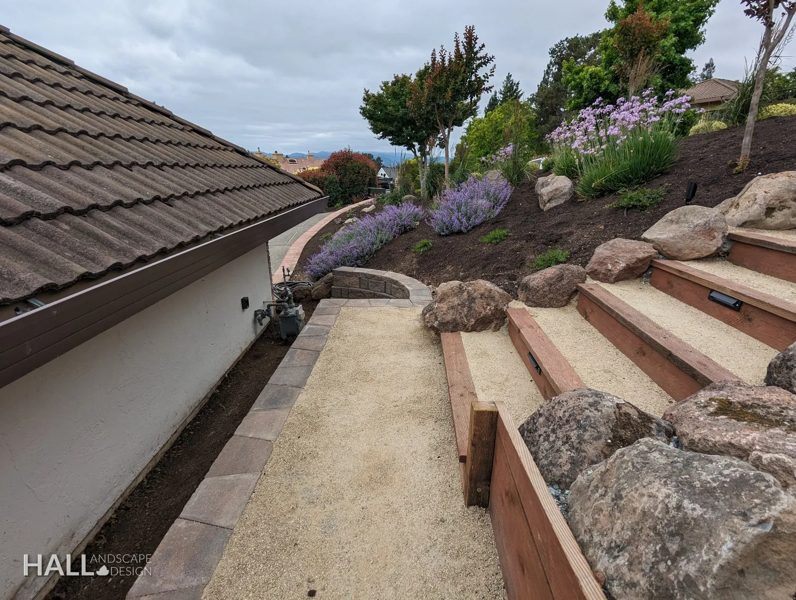 After — Gravel side slope → timber steps & a lavender bank in Fairfield