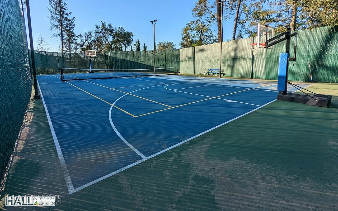 After — Rough clearing → full backyard sport court in Napa