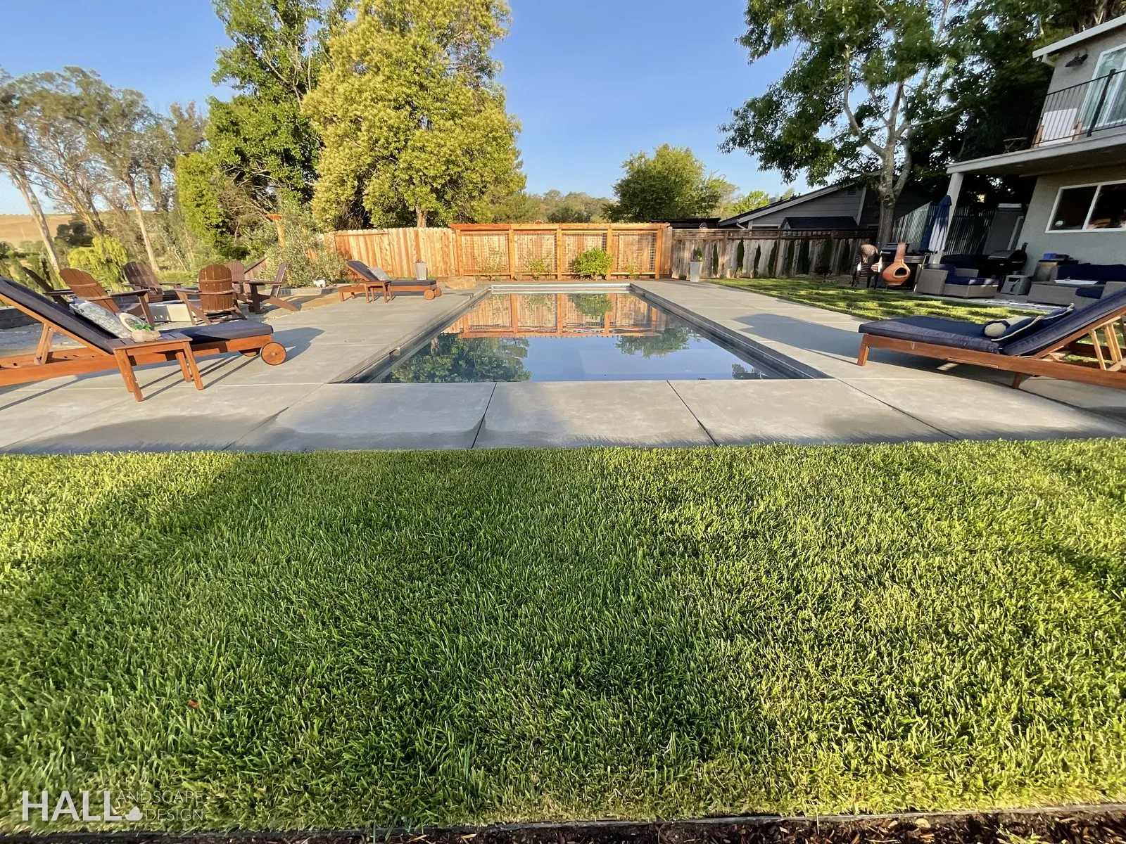 After — Plain back lawn → pool, turf & lounge terrace in Napa