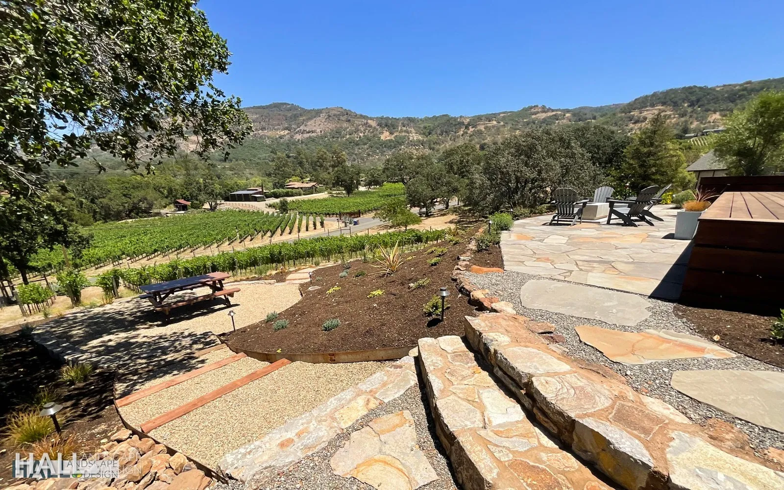 After — Flagstone steps & terraces with a vineyard view in Napa
