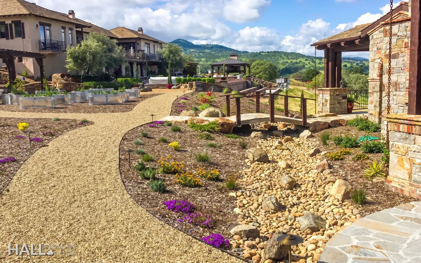After — Hillside estate: dirt lot → dry-creek garden in Napa