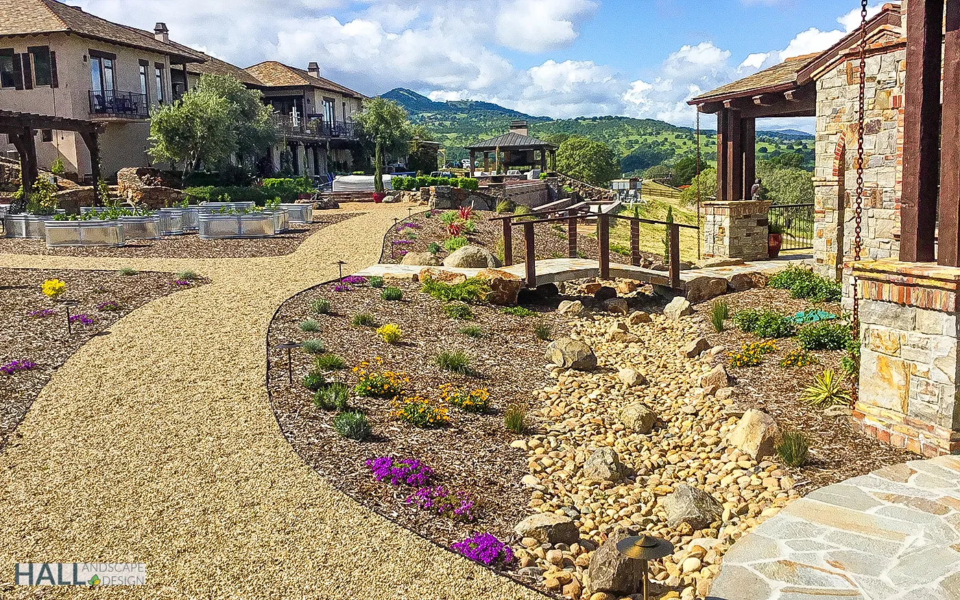 After — Hillside estate: dirt lot → dry-creek garden in Napa