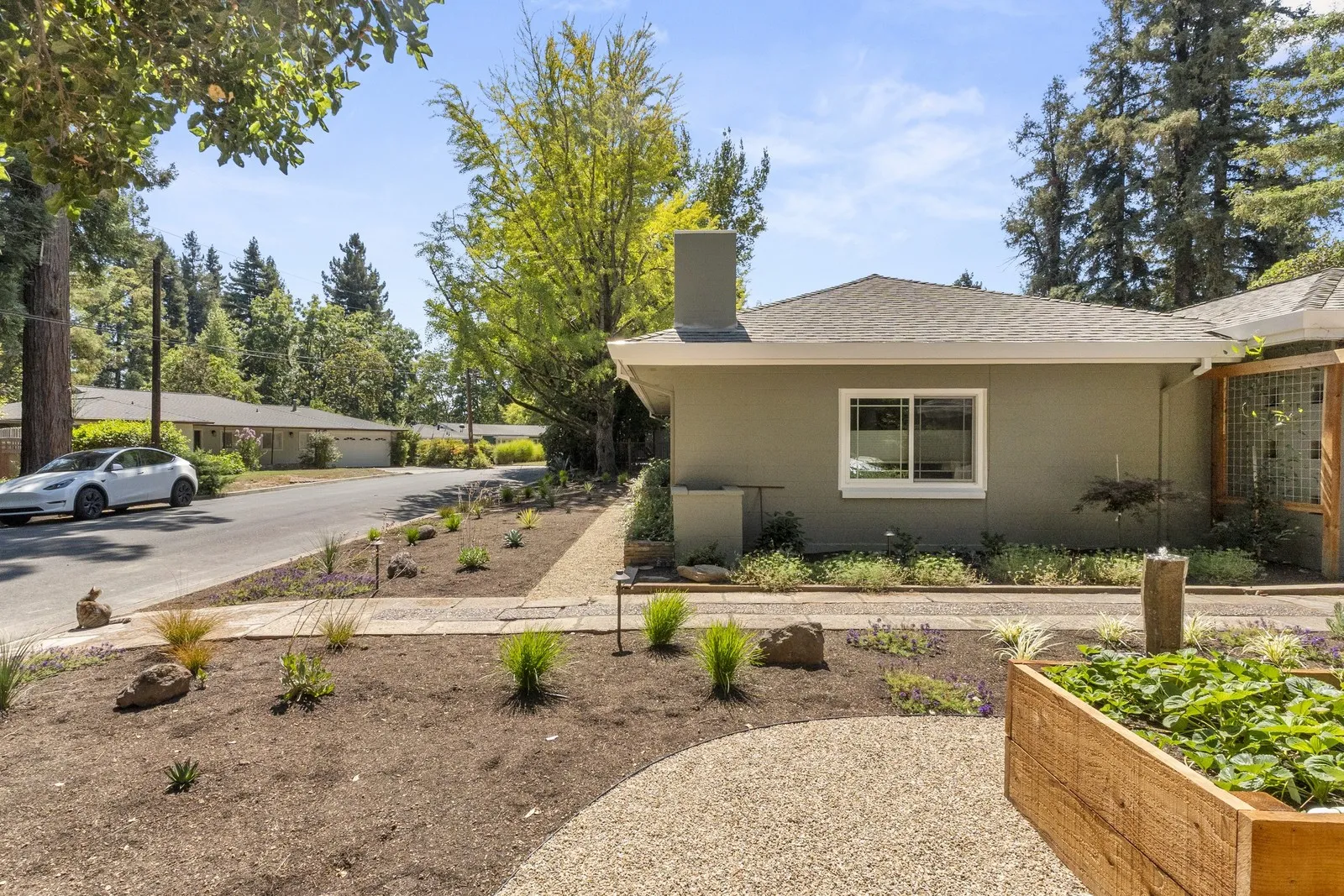 After — Street frontage → drought-tolerant garden & redwood beds in Napa