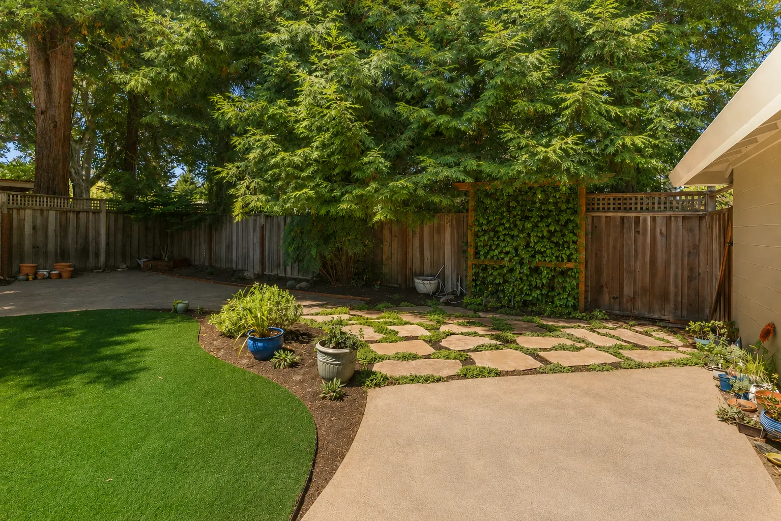 After — Backyard → flagstone path inter-planted with groundcover in Napa