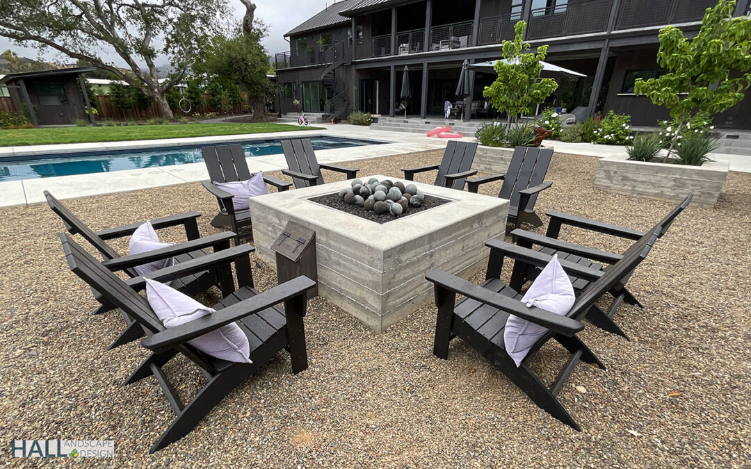 Luxury Marin County backyard with modern pool, fire pit, and outdoor lounge.