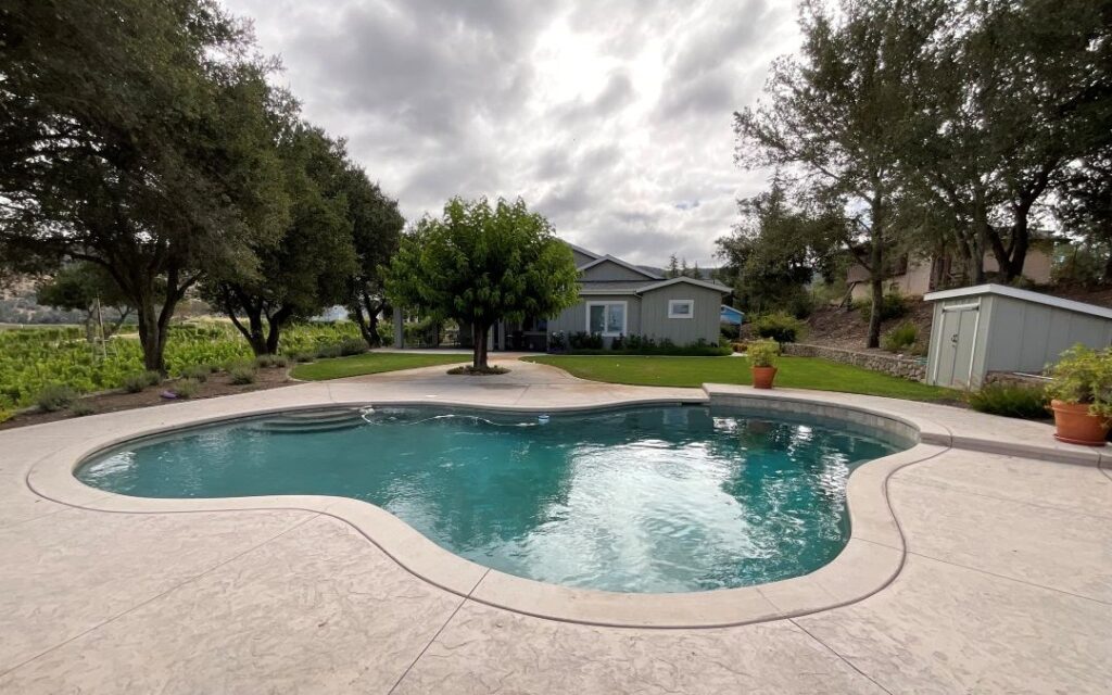 Napa backyard landscape with pool, lounge, and planting zones